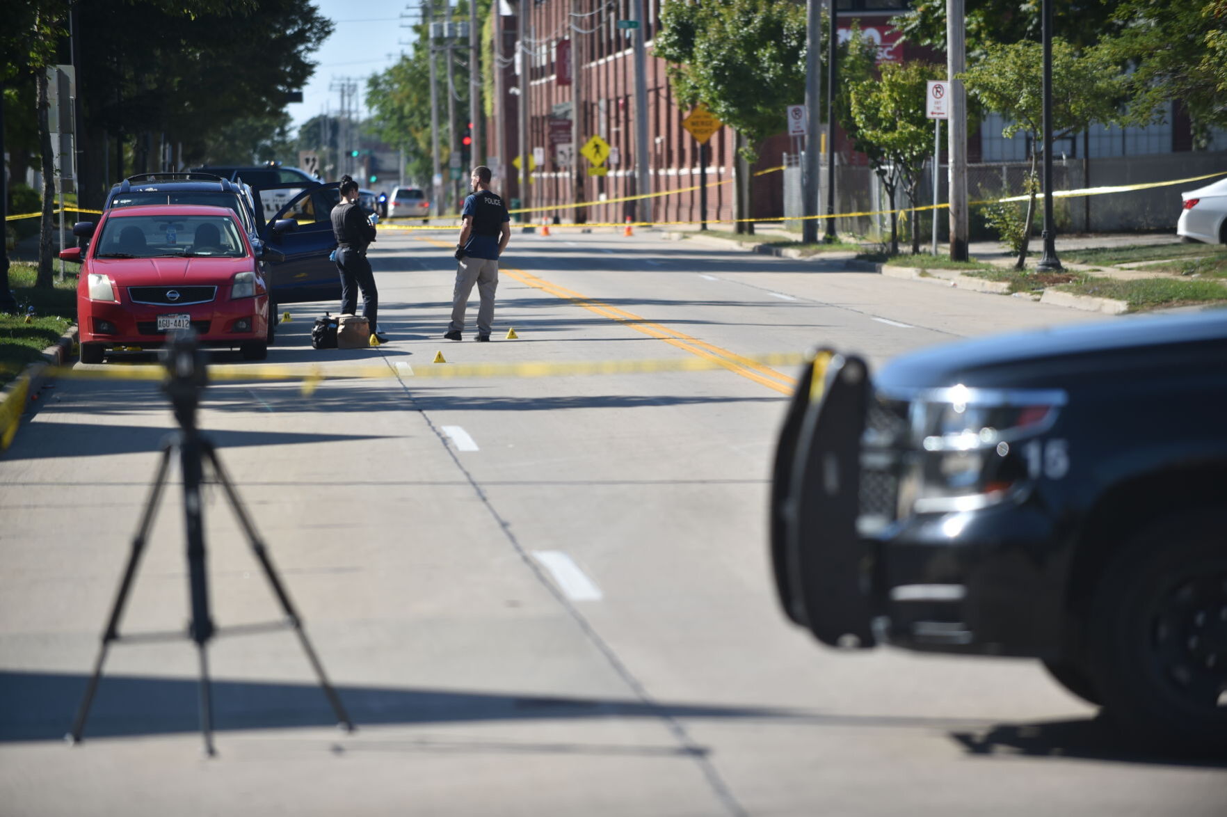 From scene of triple shooting on Racine Street, as of Monday morning